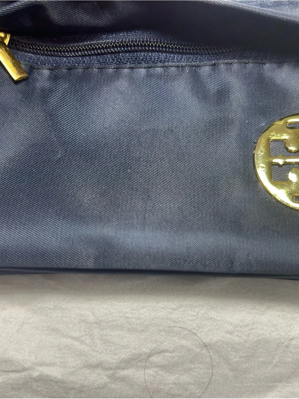 Tory Burch Navy Wristlet with Gold Emblem